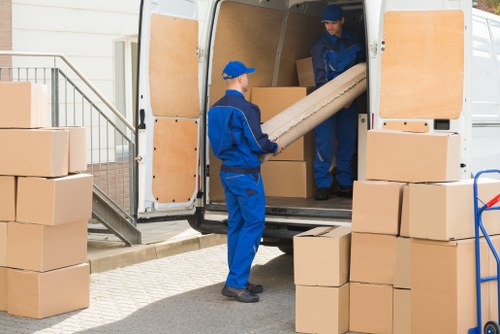 Removal van and packed boxes in a Wandsworth street