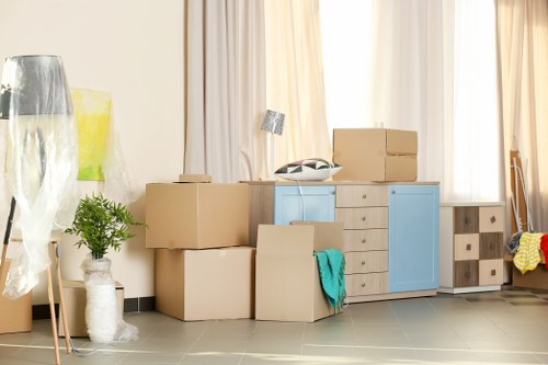 Professional removals team planning a move in Queens Park