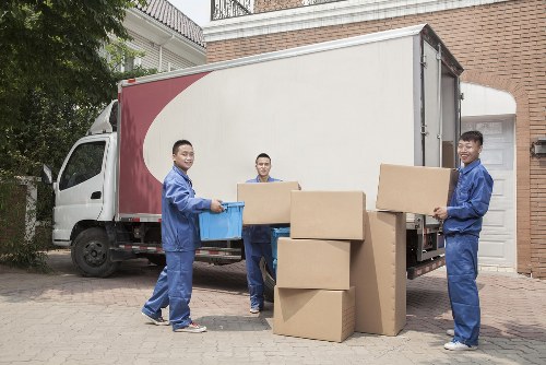 Removals van preparing for a move in Tooting street