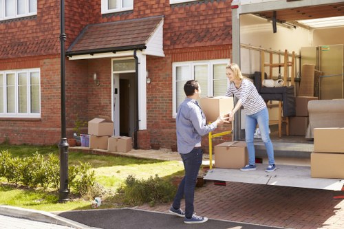 Removal van and packed boxes in Hampton