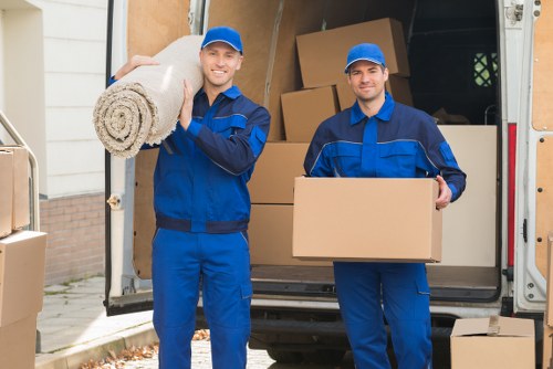 Packed moving boxes and furniture ready for Fulwell removals