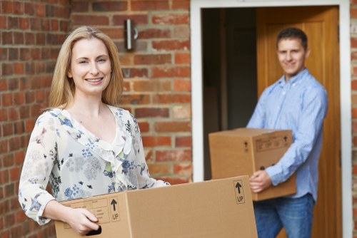 Professional movers handling furniture in Stockwell