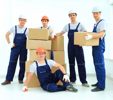 Storage boxes and wrapped furniture for local removal services