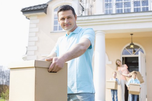 Professional movers handling furniture in Purley