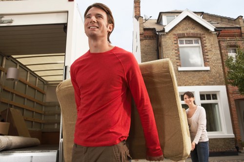 Office relocation items and packed equipment ready for transport in Roehampton