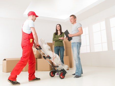 Packed boxes and furniture ready for loading during a London relocation