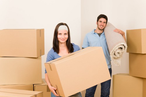 Local removals team handling furniture in Keston