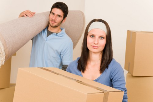 Packed moving boxes and furniture ready for Bayswater removals
