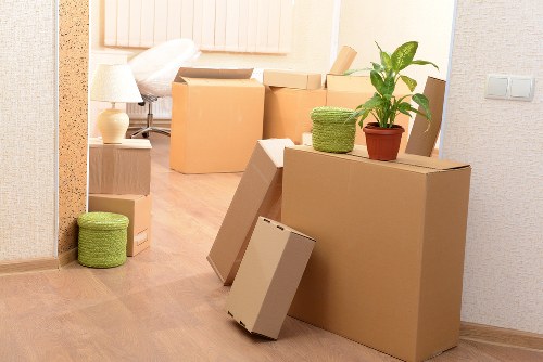 London home moving checklist and labelled boxes in a living room