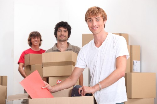 Secure storage boxes and packed items for removals in West Green