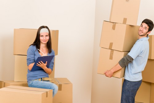 Professional movers handling furniture in Forest Hill
